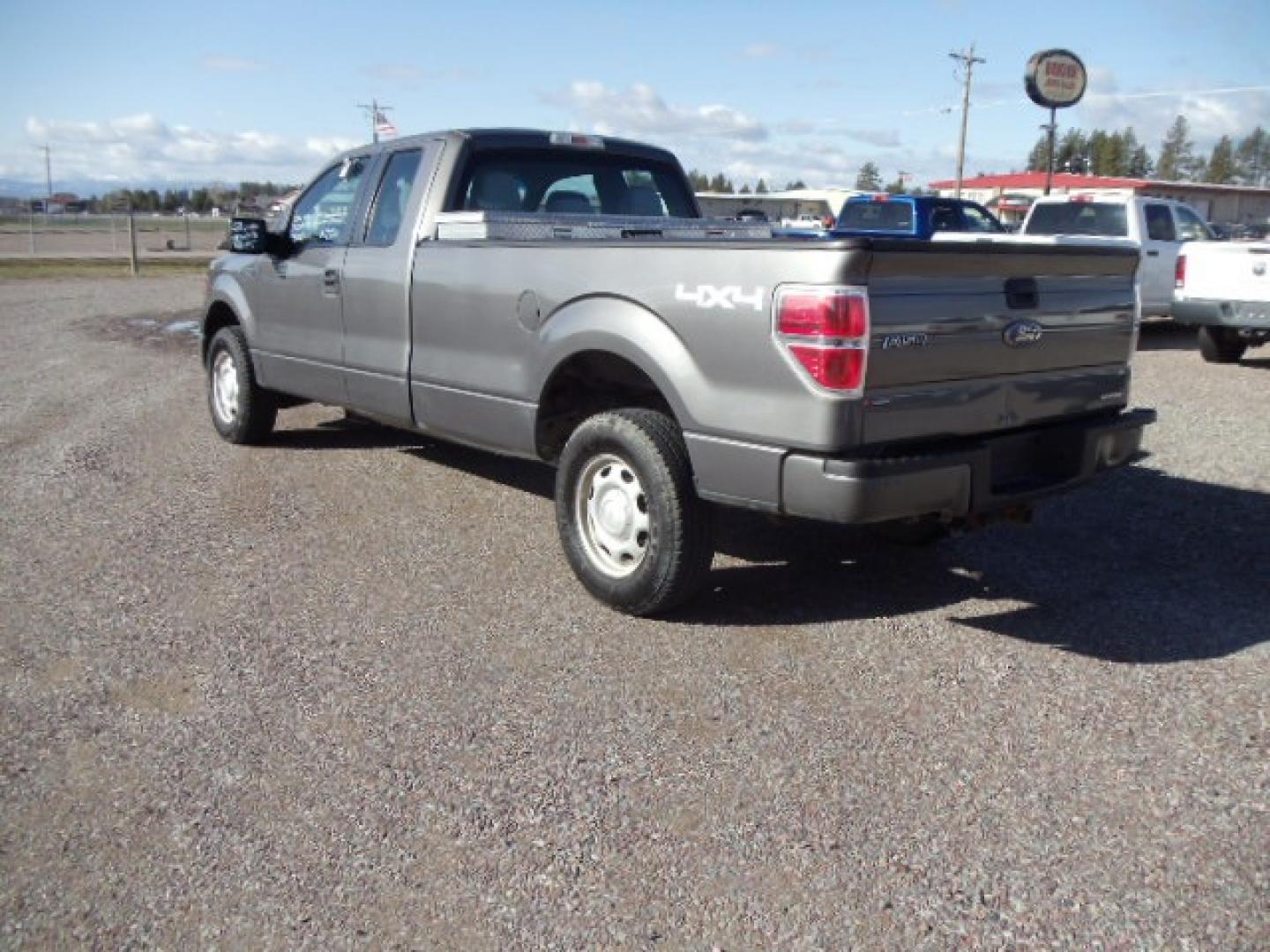 2012 Gray /Gray Ford F-150 XL (1FTFX1EF3CK) with an 5.0 L V8 Gas engine, Automatic transmission, located at 5465 Highway 2 W., Columbia Falls, MT, 59912, (406) 892-4407, 48.352188, -114.240929 - This truck was previously owned by the federal government so it has been well maintained and taken care of. The truck is very clean inside and out with near new tires and low actual miles. This vehicle has been mechanically inspected. This is the XL and its a quad door long box. - Photo#4